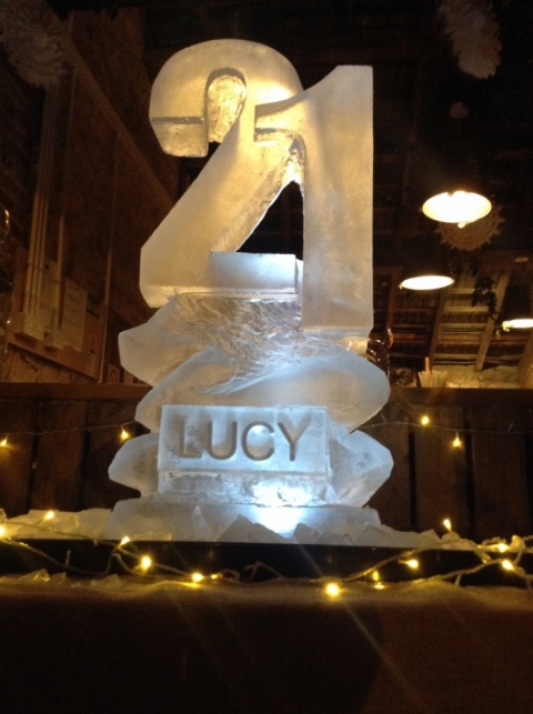 21 number with name carved into the base Vodka Luge from Passion for Ice