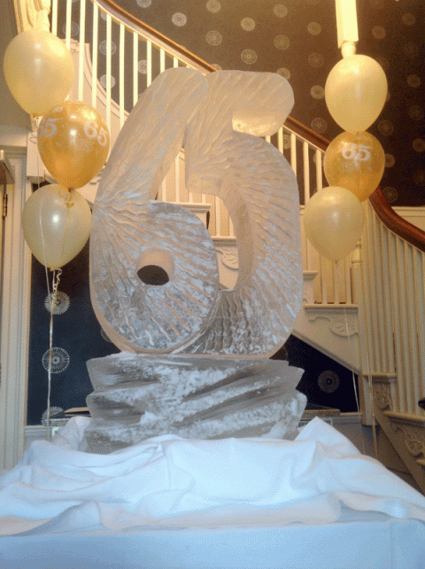 65 -shaped Vodka Luge from Passion for Ice
